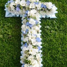 white &amp; pale blue cross